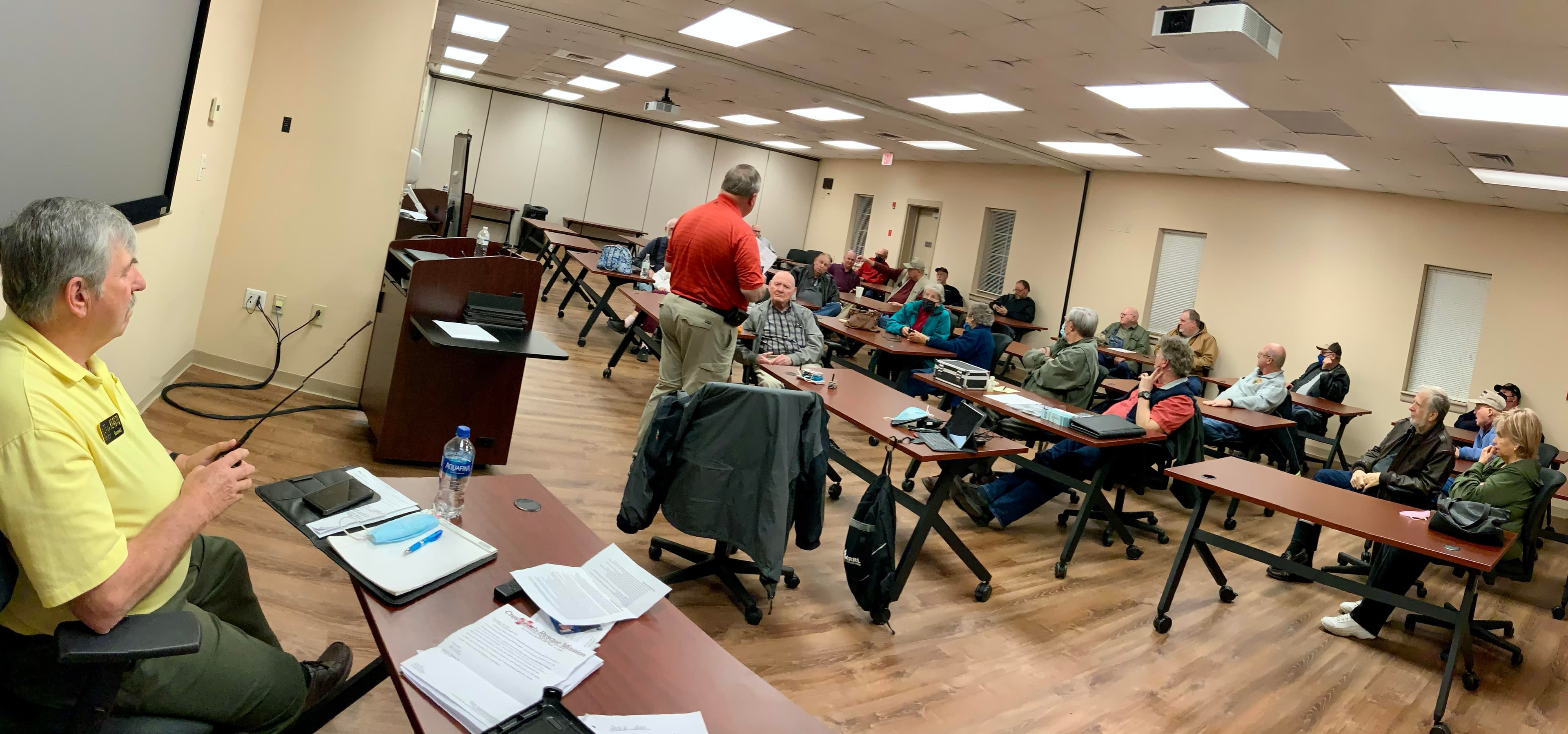 Members at a monthly club meeting